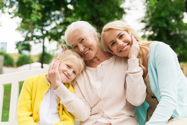Three generation females on bench